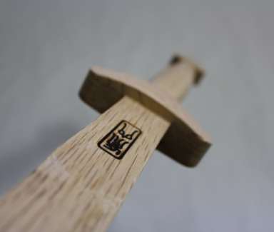 Lightweight mujian in white oak. Finished with clear lacquer. Designed for tai chi forms practise. 